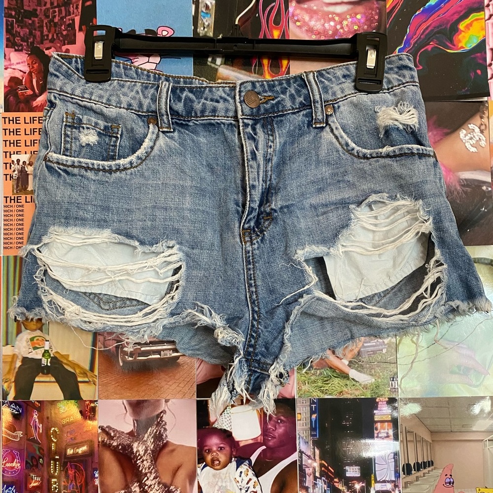 Mid Rise Distressed Denim Shorts